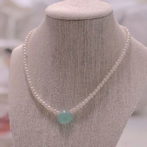 Handmade Pearl-like‎ beaded strand with turquoise colored focal bead